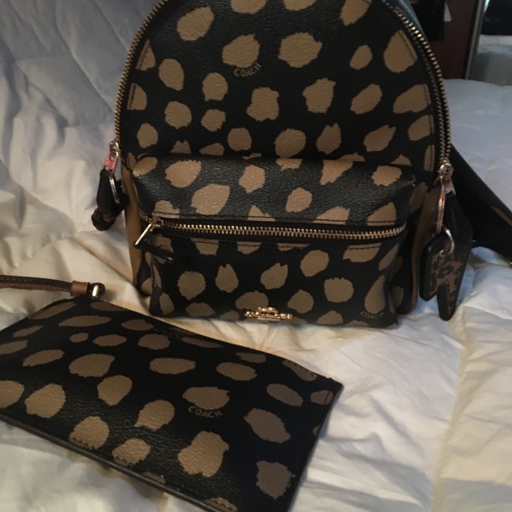 Coach Mini Charlie backpack and wristlet .